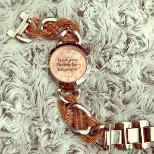 New. Never used. Akribos rosegold watch.